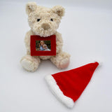 Personalised Christmas Teddy Bear with a red felt photo frame which has a photo of 2 children printed in it.