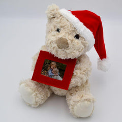 Personalised Christmas Teddy Bear with a red felt photo frame which has a photo of 2 children printed in it.