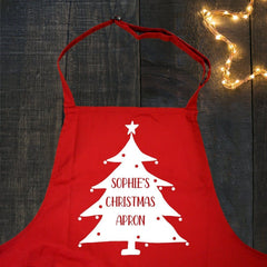 A close up of a red personalised Christmas apron