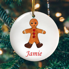 A personalised Christmas decoration with a gingerbread man printed onto it