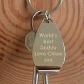 a personalised metal bottle opener keyring engraved with the message "world's best daddy, love Chloe"