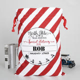 A personalised Christmas sack with red and white stripes and a personalised name in black lettering