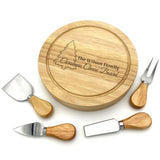 A wooden cheese board and knife set personalised with a Christmas tree and a custom message.