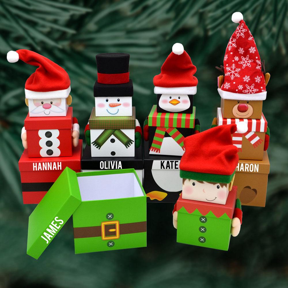 Personalised Christmas gift boxes with Santa, snowman, penguin, reindeer and elf designs.
