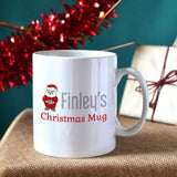 A personalised Christmas mug with a Santa design and custom name