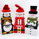 Personalised Christmas gift boxes with Santa, snowman and penguin designs.