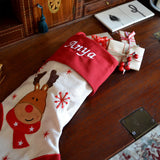 a personalised christmas stocking with presents inside
